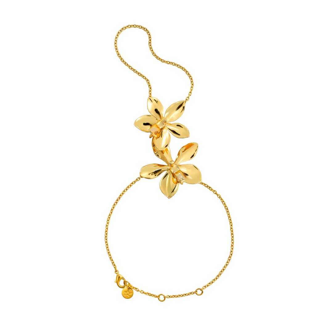 Risis Aeridovanda Blooms Hand Chain - A gold bracelet with interlinked, polished flowers creating an elegant cascade, complemented by a delicate chain and adjustable clasp.