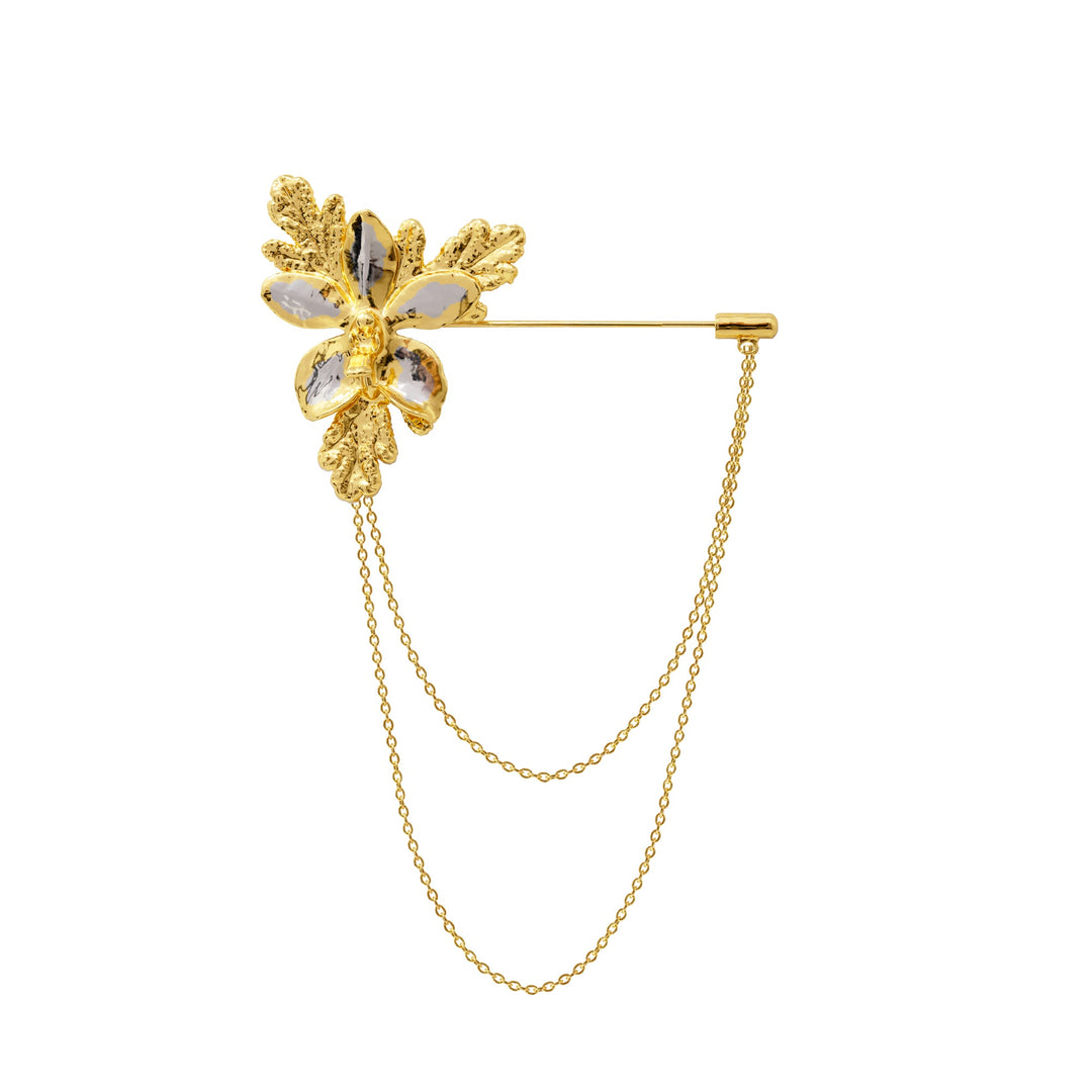 RISIS Natural Aeridovanda Orchid Brooch encapsulated in 24K Swiss Gold and Palladium Silver with Natural Citronella leaves