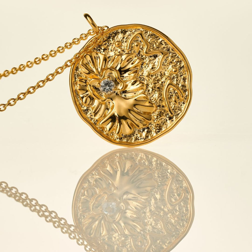 RISIS Athena Pendant Necklace encapsulated in 18K Gold with White Topaz