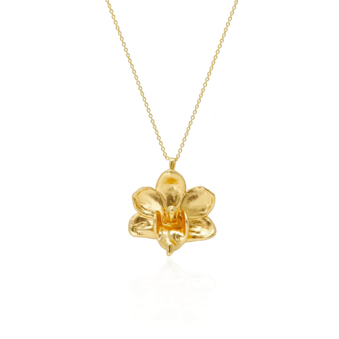 Risis Doritaenopsis Purple Gem Orchid Necklace (G) - A glossy golden pendant shaped like a five-petaled flower hangs from a delicate chain, reflecting light with a lustrous sheen.