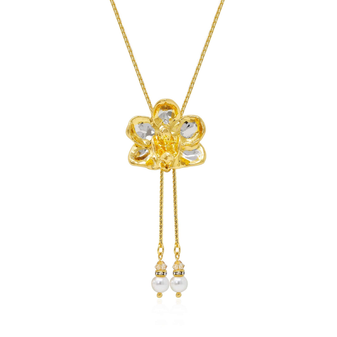 Risis Doritaenopsis Purple Gem Orchid Slider Necklace with Pearl Tailends (PG) - A golden floral pendant with a lustrous pearl and crystal dangle, suspended from a delicate chain.