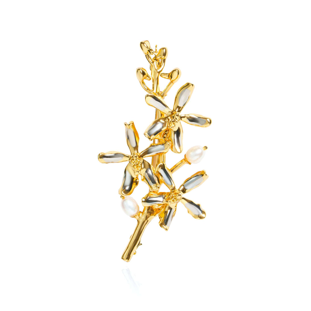 Risis Renantanda Symphony Brooch with Pearls - An ornate golden brooch with silver and pearl accents, designed to resemble a stylized branch with leaves or petals.