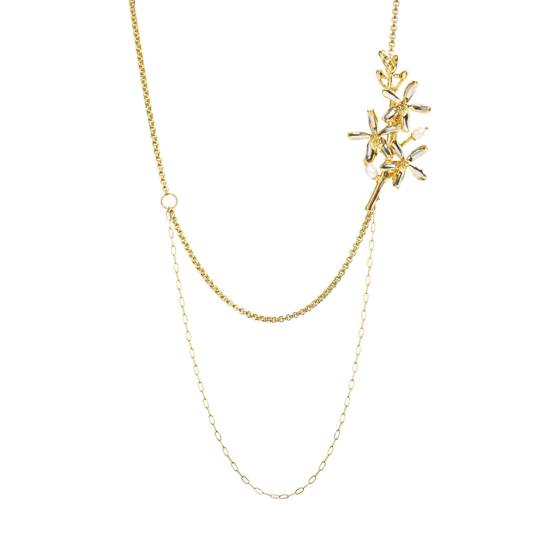 Risis Renantanda Symphony Necklace with Pearls - This is a gold necklace with a branched, leafy pendant adorned with small pearls, linked by a delicate chain with a looped design element.