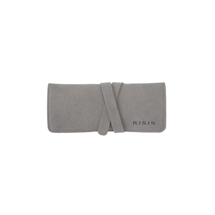 Risis - A slate gray jewelry pouch with a smooth texture and a simple wrap-around band closure, displaying the brand name "RISIS" on the lower right corner.