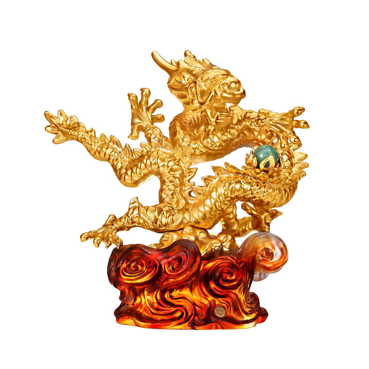 Risis The Imperial Dragon on Amber Liu Li - A golden dragon sculpture with intricate scales holds a blue orb, perched on swirling red and gold flames. Its dynamic pose suggests power and grace.