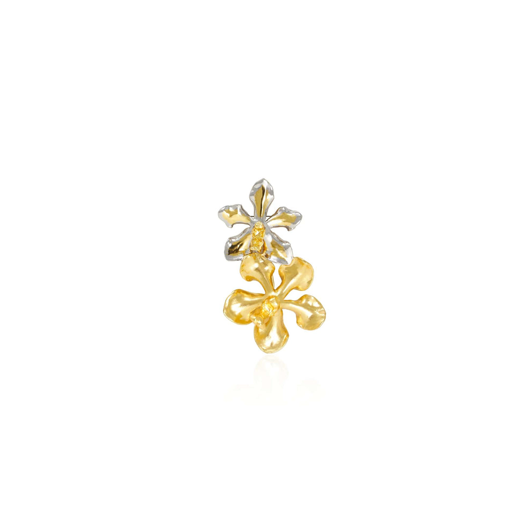 Risis Vanda And Kagawara Orchid Brooch - A gold and silver floral earring with delicate petals and a central stud, exuding elegance and shine against a plain backdrop.