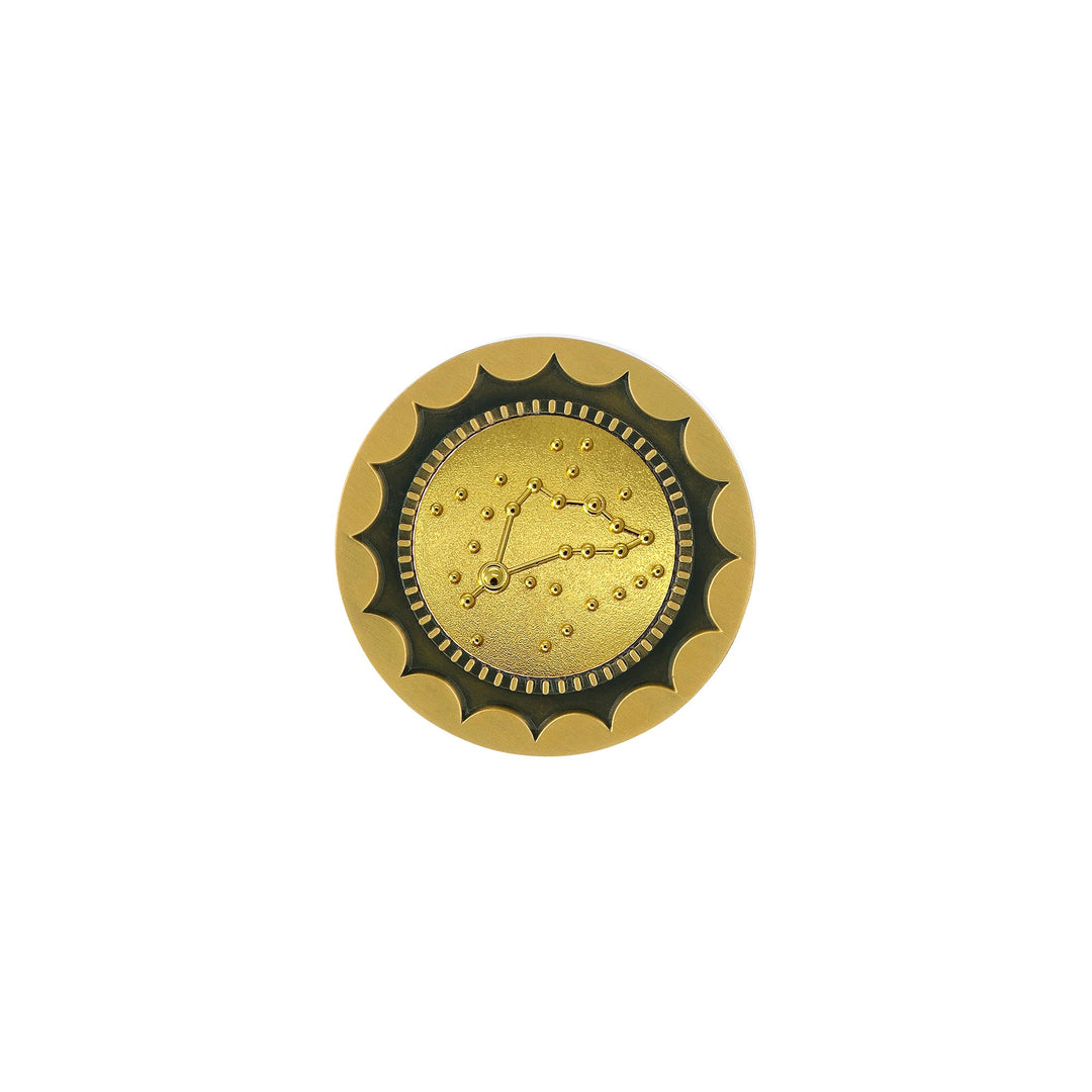 Risis 12 Constellation Base (Capricorn) - A golden, circular coin with a scalloped edge displays an embossed constellation design surrounded by small dots.