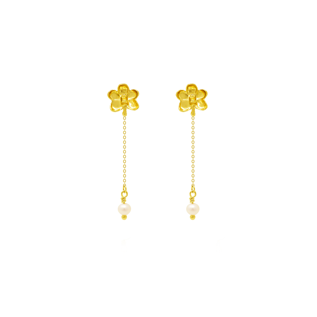 Risis Ascocenda Moments Earrings with Pearls - A pair of gold dangle earrings with flower-shaped studs and a pearl hanging on a delicate chain at the end.