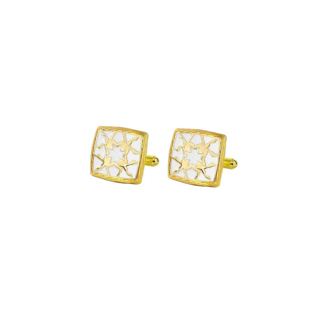 Risis Peranakan Orchid with White Enamel Cufflinks - Gold cufflinks with a square design, featuring a pattern of stars within a grid, on a translucent creamy background.