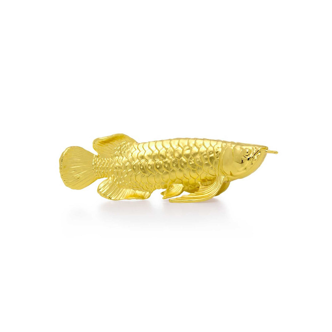 Risis Arowana - A shiny golden fish brooch with detailed scales and fins, exhibiting an elegant and decorative aesthetic.