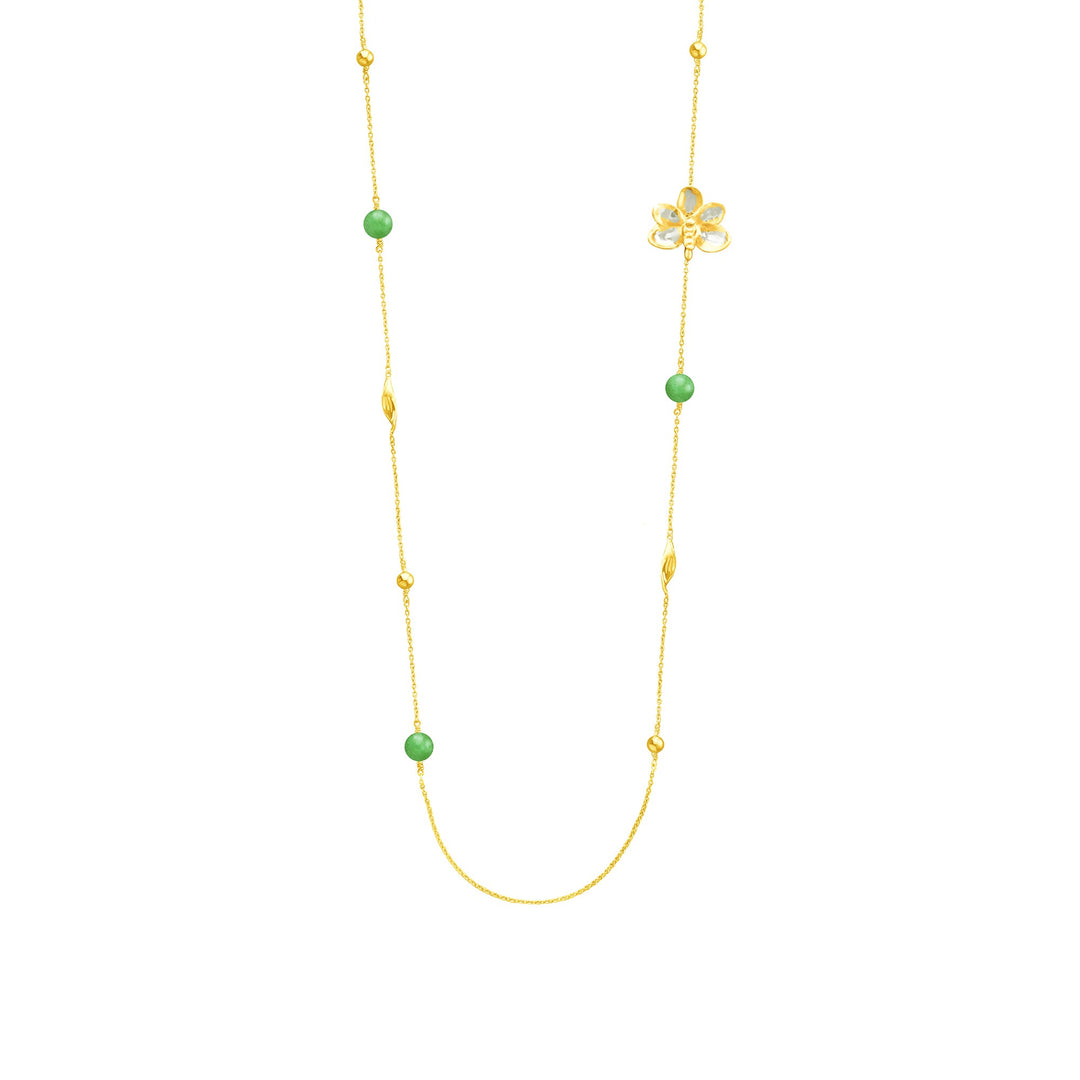 Risis Ascocenda Blossom Necklace - A delicate gold necklace features evenly spaced green beads and ornamental gold twists, accented with a central gold flower pendant.