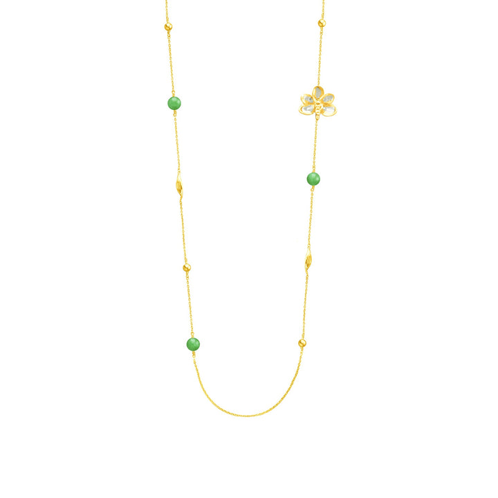 Risis Ascocenda Blossom Necklace - A delicate gold necklace features evenly spaced green beads and ornamental gold twists, accented with a central gold flower pendant.