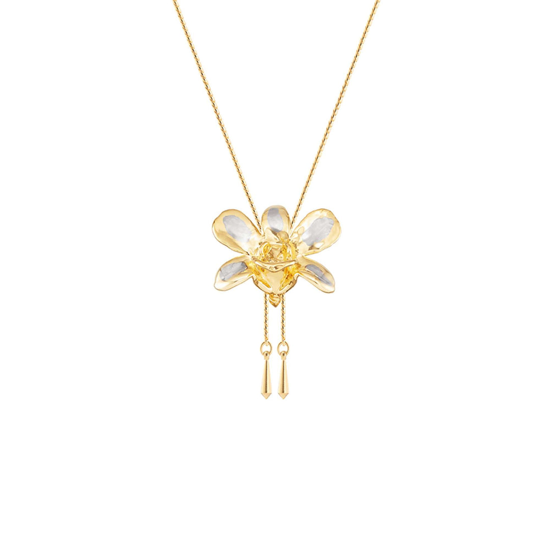 Risis Dendrobium Thong Chai Orchid Slider Necklace (PG) - A gold necklace with a translucent flower pendant, featuring gold accents and suspended delicate gold tassels, radiates elegance and simplicity.