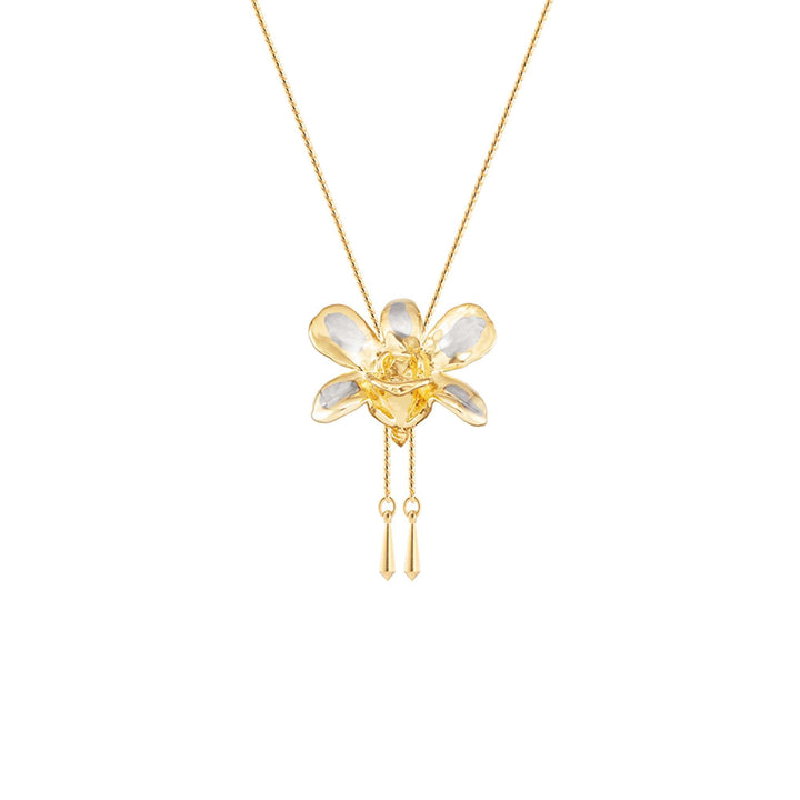 Risis Dendrobium Thong Chai Orchid Slider Necklace (PG) - A gold necklace with a translucent flower pendant, featuring gold accents and suspended delicate gold tassels, radiates elegance and simplicity.