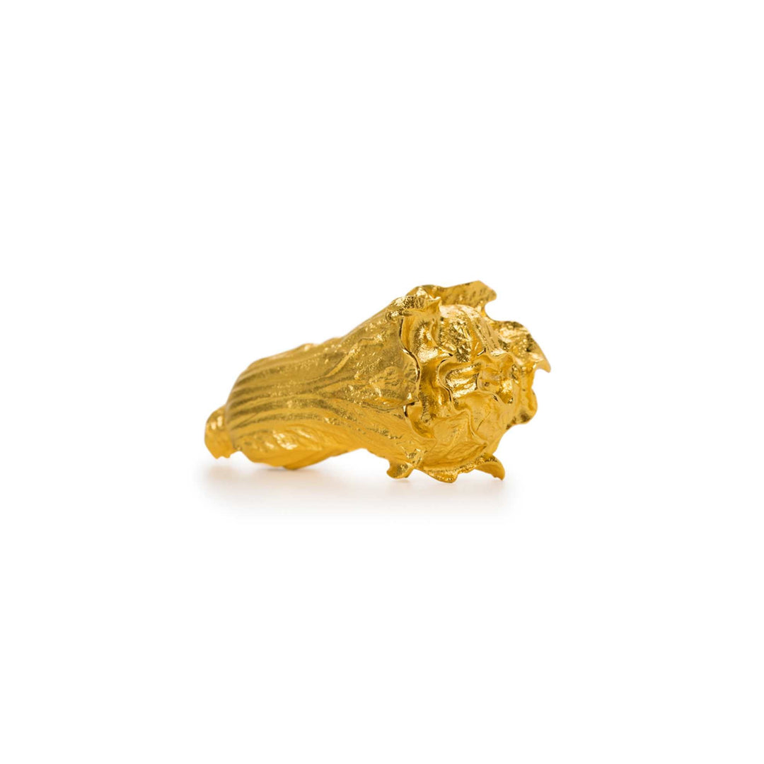 Risis Golden Harvest Pak Choy - A shiny golden-colored jewelry piece, intricately textured, evokes a sense of organic fluidity and elegance.
