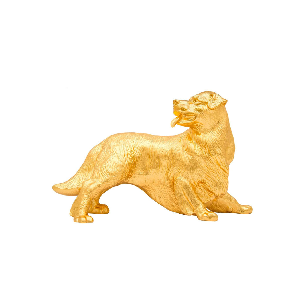Risis Legend of XII - Dog - A golden sculpture of a sitting dog with textured fur details, exuding a shiny, metallic finish and an animated expression with its tongue out.