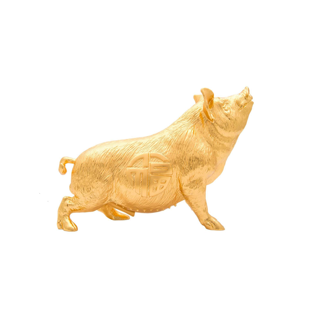 Risis Legend of XII - Pig - A golden pig figurine, mid-stride, with a textured surface and Chinese character embellishment on its side.