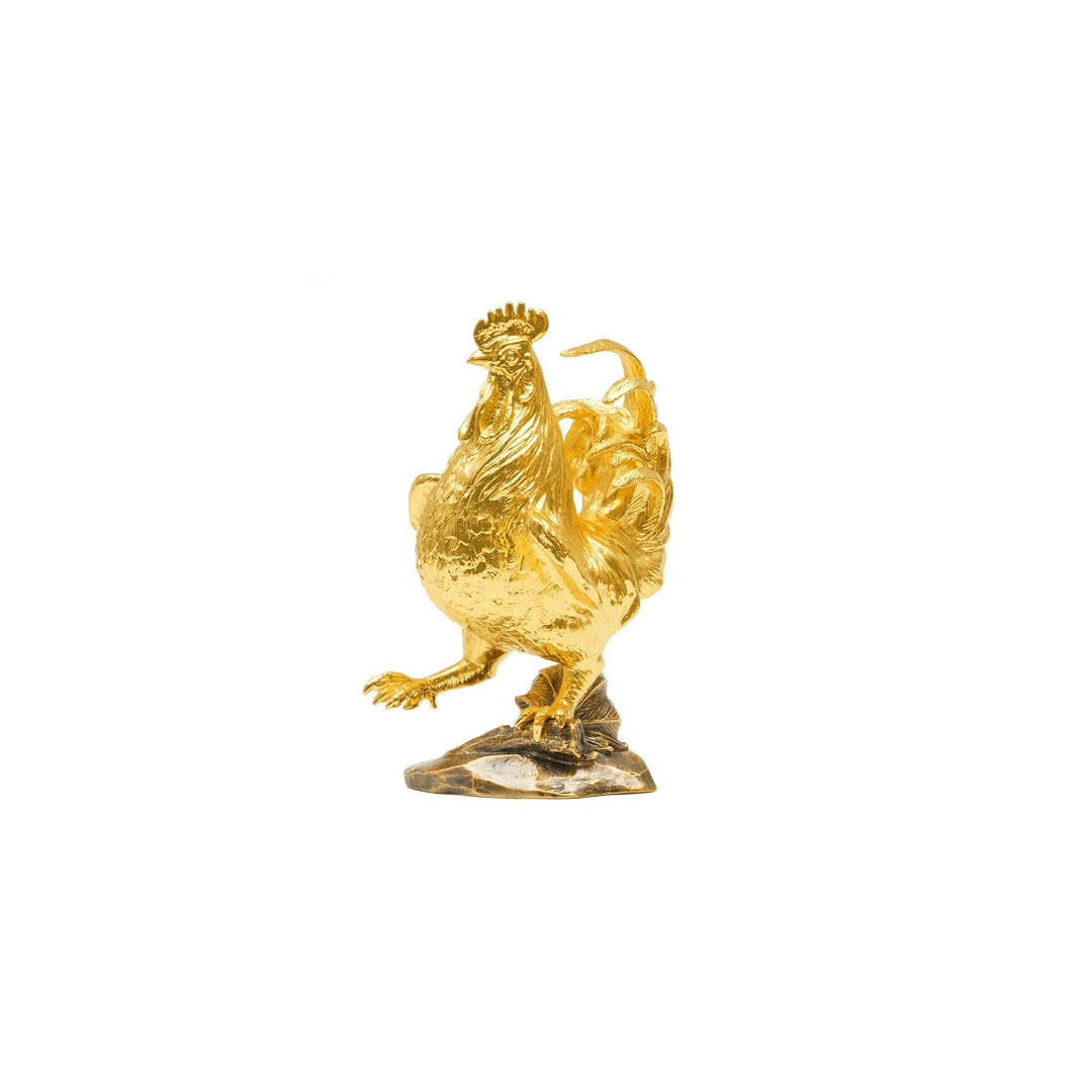 Risis Legend of XII - Rooster - A golden rooster figurine stands, with intricately sculpted feathers and a proud posture, radiating opulence and craftsmanship.