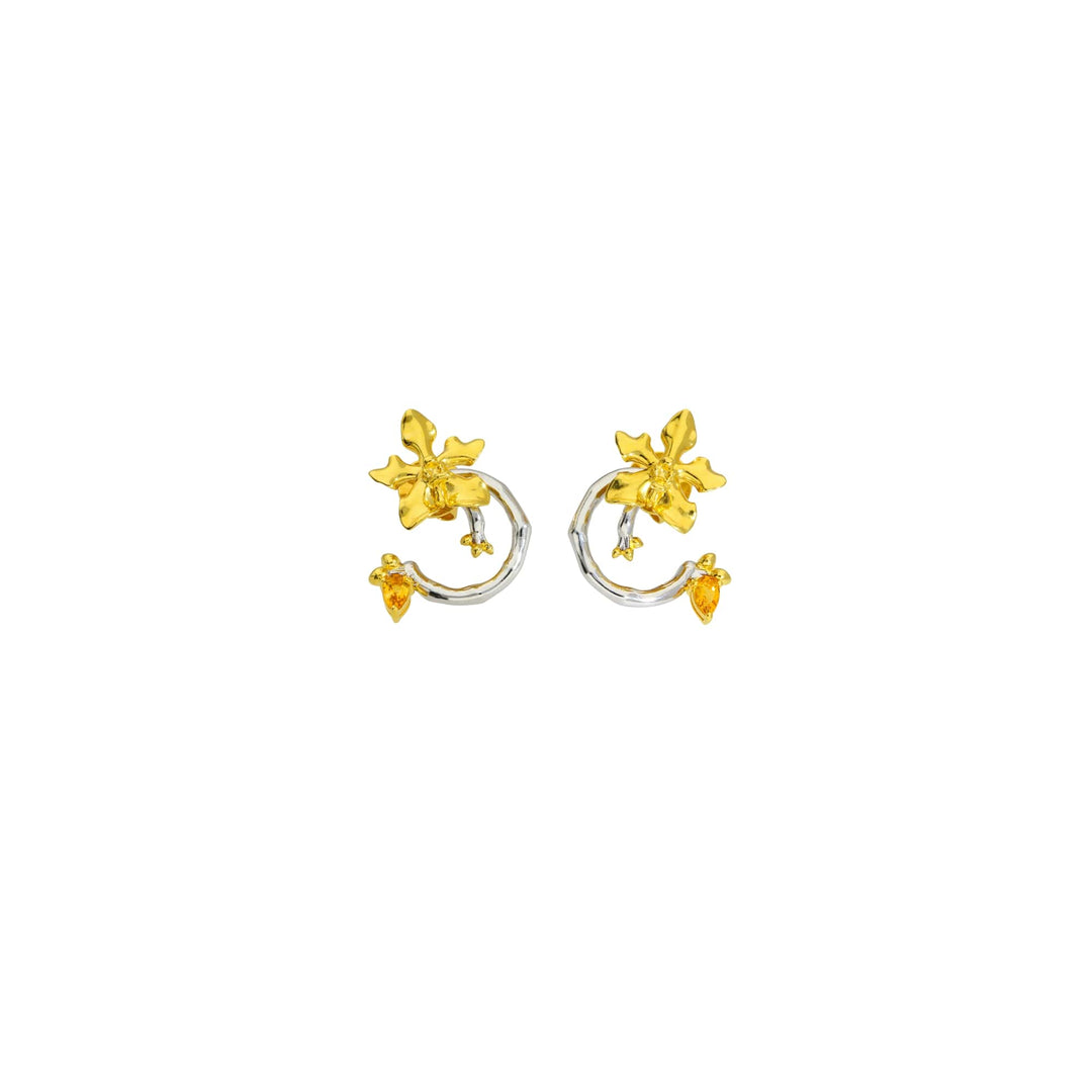 Risis Orchid Spiral Earrings - A pair of circular silver earrings with ornate yellow gold accents resembling flowers and small hanging leaves, showcasing elegance and craftsmanship.