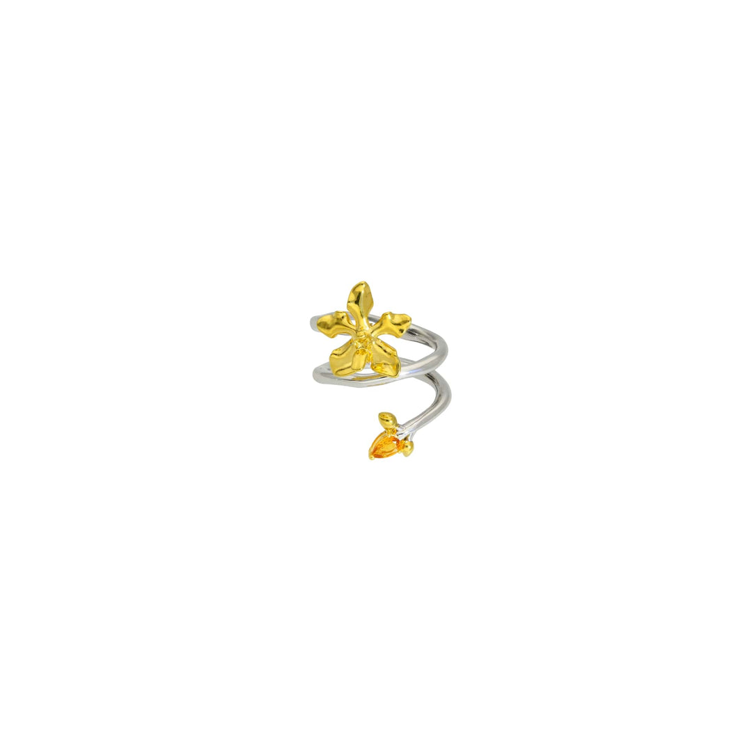 Risis Orchid Spiral Ring - A spiral silver ring with two glossy, golden-yellow orchid embellishments, one larger at the top and a smaller one at the base.