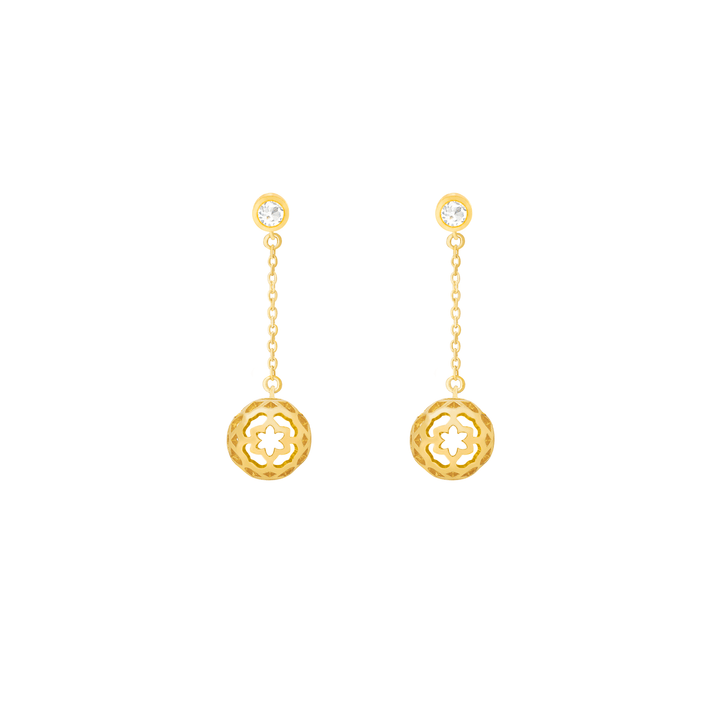 Risis Peranakan Spheres Dangling Earrings with White Topaz (G) - A pair of gold dangle earrings with a circular floral motif and a shiny gemstone at the earlobes.