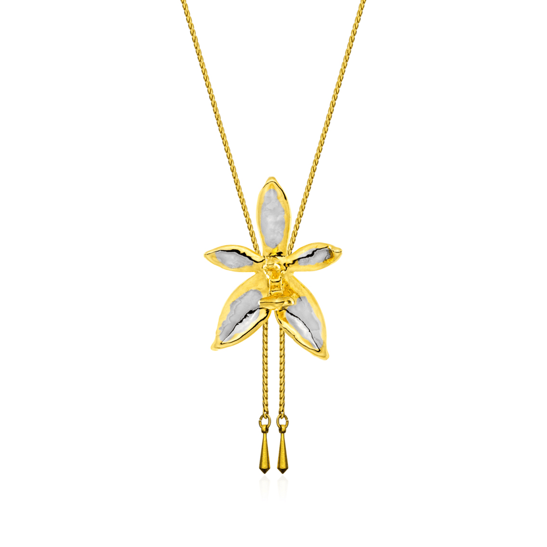 Risis Phalaenopsis Cornu Cervi Orchid Slider Necklace (PG) - An elegant gold necklace with a pendant shaped like a stylized flower, featuring translucent petals, likely mother-of-pearl, with gold trim and two dangling gold tassels.