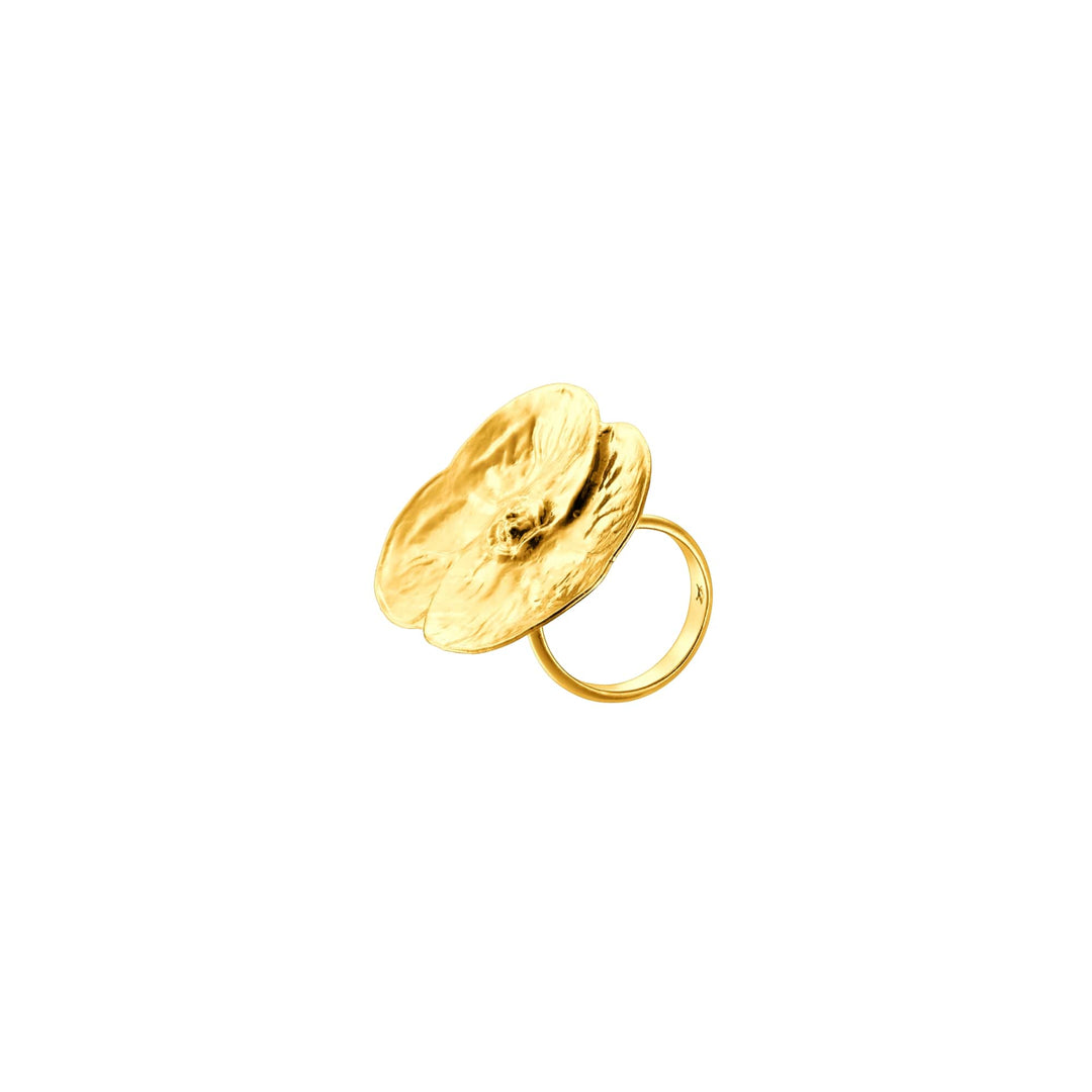 Risis Promesse Ring (G) - A golden ring with a large, irregularly shaped, textured disc, creating an artistic and organic appearance.