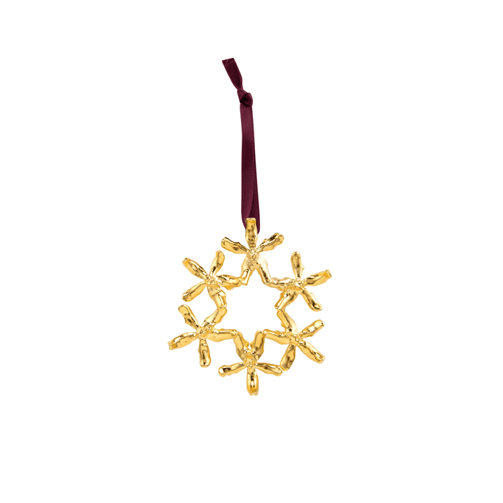 Risis Renantanda Sawadi Orchid Ornament (G) - A golden snowflake-shaped ornament dangles from a dark red ribbon, featuring intricate, glossy twists resembling ice crystals.
