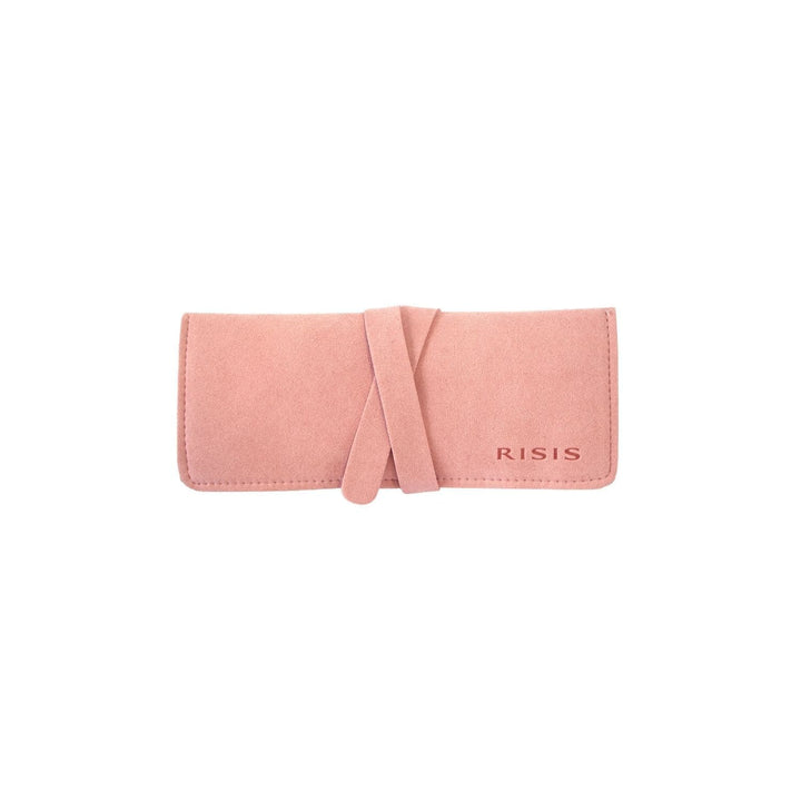 Risis - A soft pink jewelry pouch is wrapped with a lighter pink band, featuring the embossed brand name "RISIS" near the lower right corner.