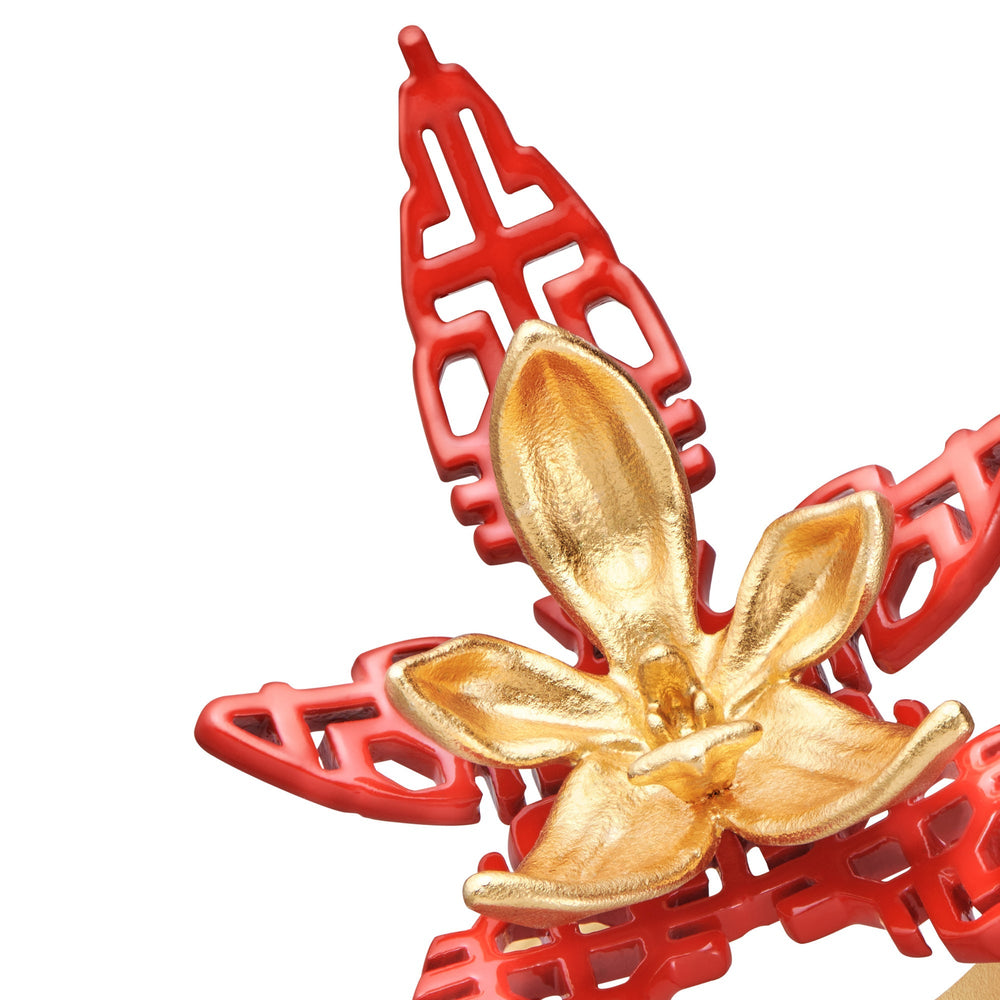 Risis X TRIOLOGIE Iconic Phalaenopsis Orchid Ring - A vibrant red lattice structure cradles a radiant gold flower, blending intricate details with bold colors in an artistic, jewelry-like composition.