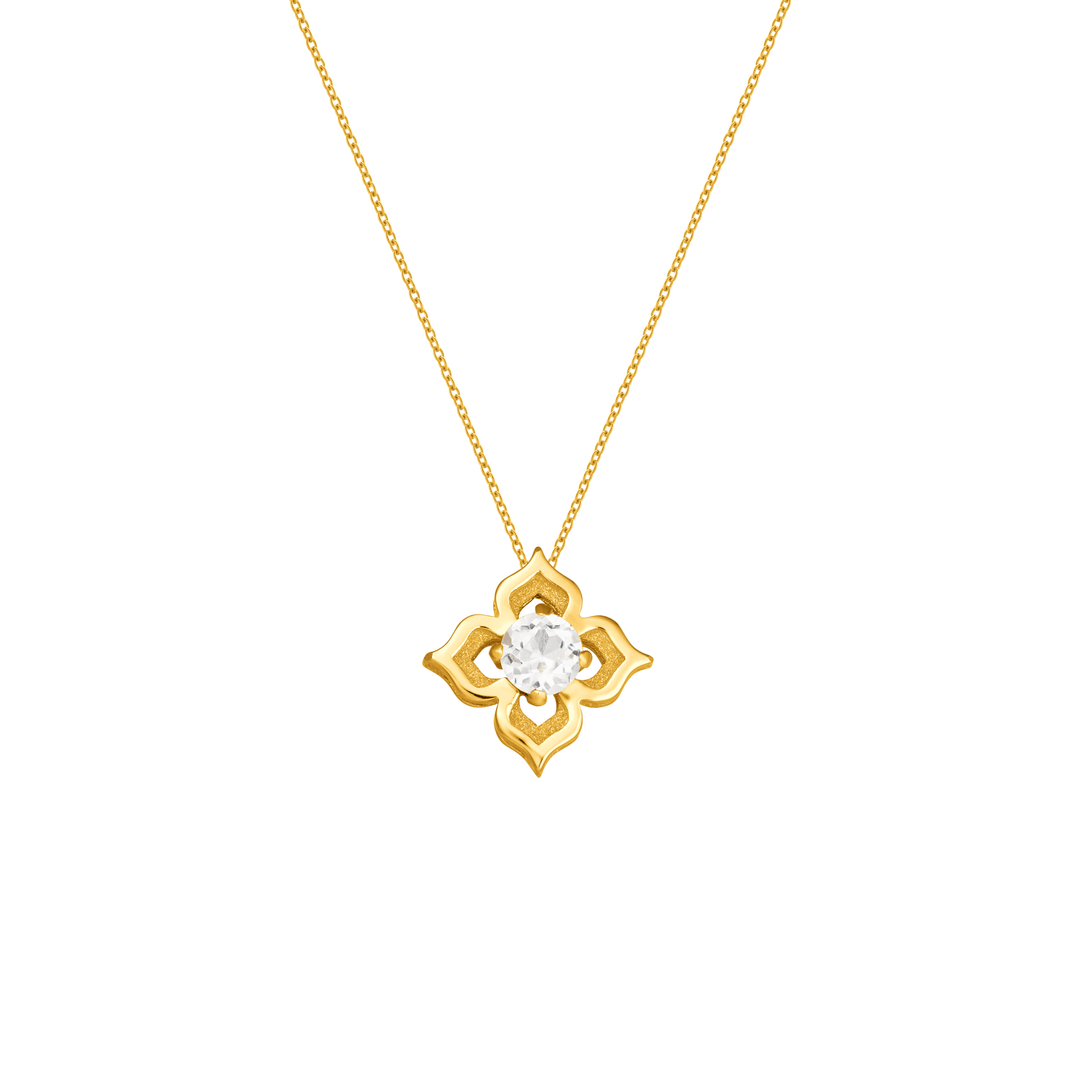 Risis Timeless Peranakan Small Necklace with White Topaz - A golden necklace with a delicate chain holds a flower-shaped pendant featuring a central sparkling gem surrounded by gold petals.