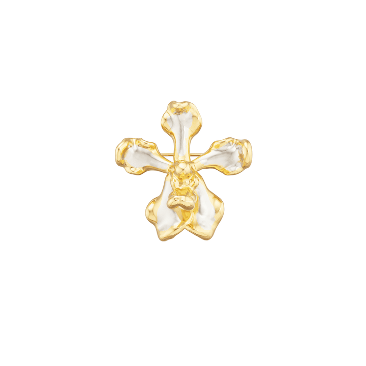 Risis Vanda Wee Kim Lian Orchid Brooch/Pendant (PG) - A golden cross pendant with an irregular, molten-like surface and a glossy finish rests against a plain backdrop, showcasing its artistic, sculptural qualities.