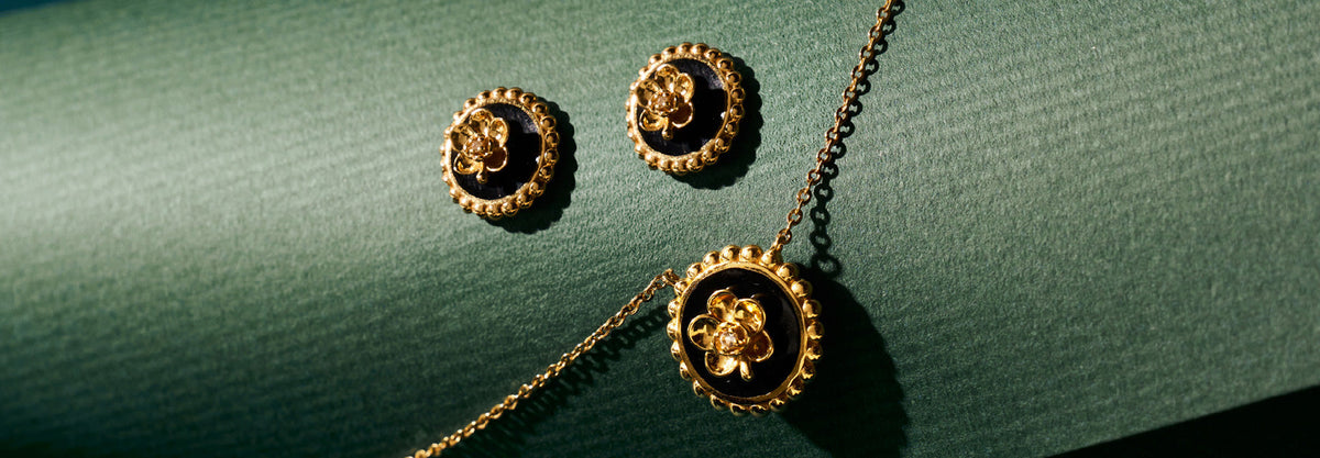 Beaded Ascocenda II Edition 925 Silver Jewellery Necklace Earrings Encapsulated in 18K Gold with Black Enamel and White Topaz