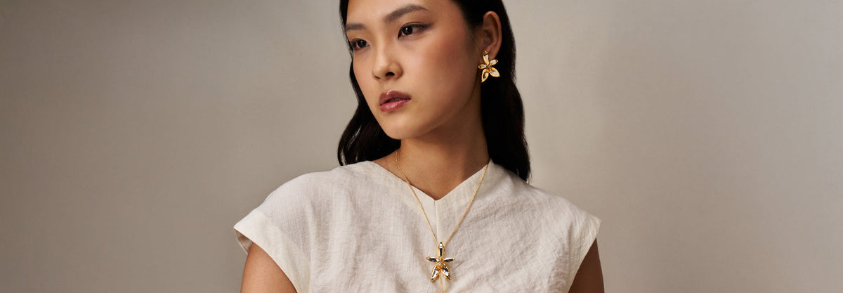 Natural Phalaenopsis Orchid Blossom Jewellery Earrings and Necklace encapsulated in 24K Swiss Gold and Palladium