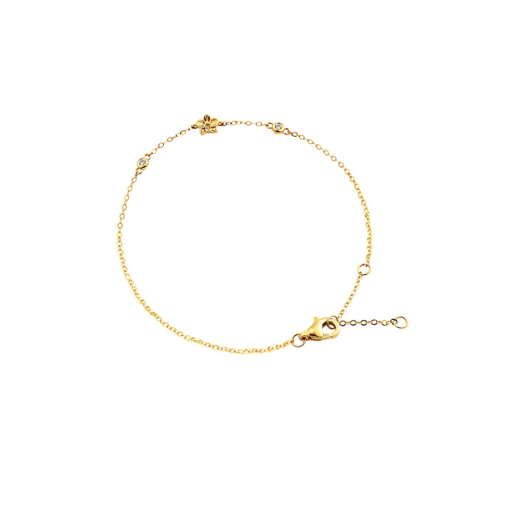 14K yellow gold bracelet with orchid bloom charm and small diamond accents