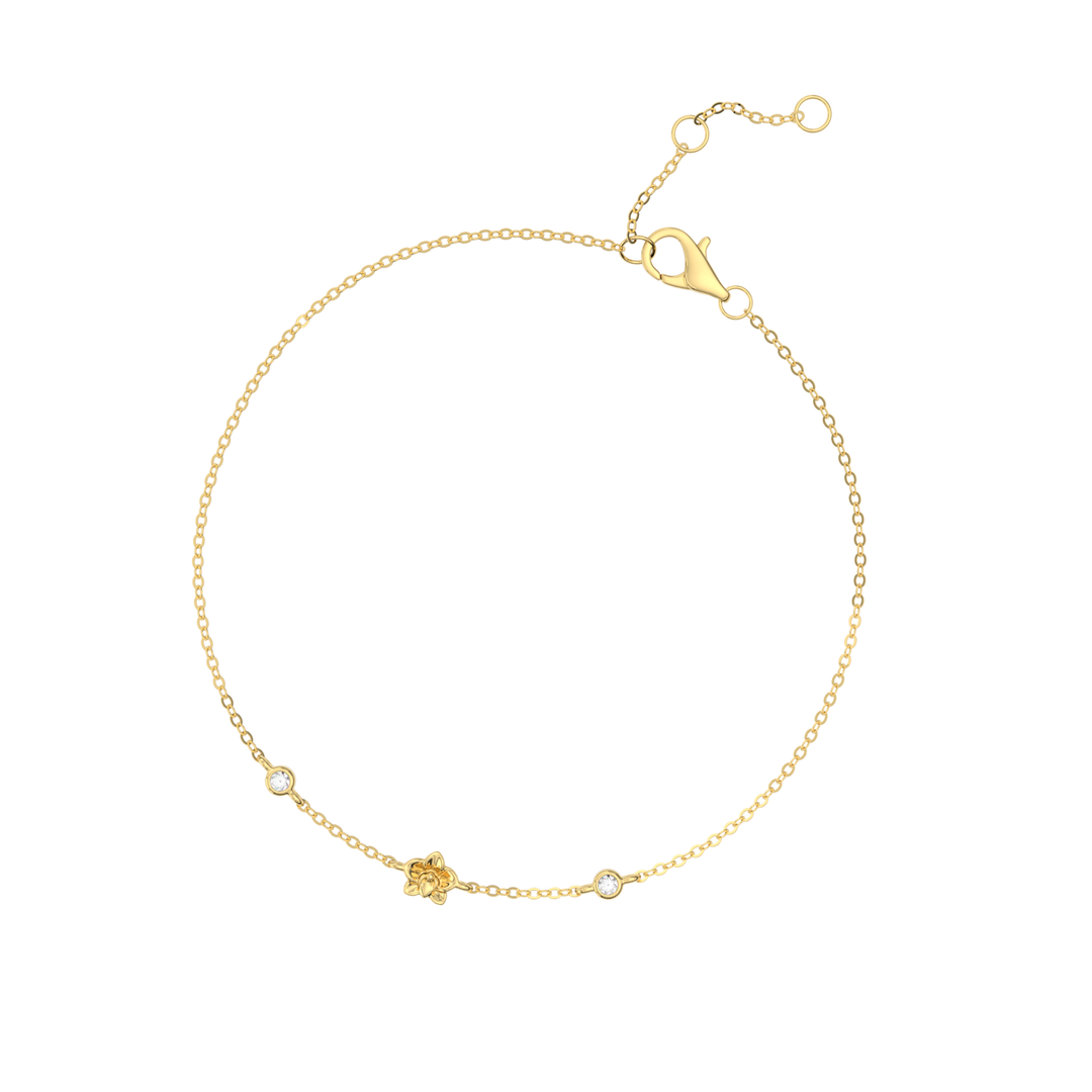 14K yellow gold bracelet with orchid bloom charm and small diamond 