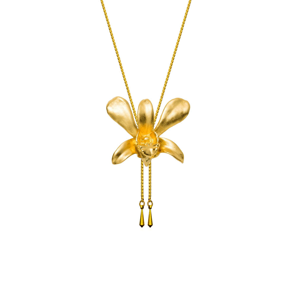 Risis Dendrobium Li Min Eng Orchid Slider Necklace (G) - A golden necklace with a translucent, amber-hued, flower-shaped pendant; two delicate chains with teardrop accents dangle below, adding elegance.