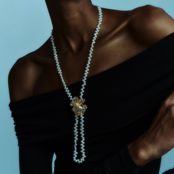 RISIS Dual-Wear Orchid Pearl Necklace & Brooch, Natural Oncidium Wildcat Orchid and brass chain encapsulated in 24K Swiss Gold and Palladium Silver with Freshwater Pearl