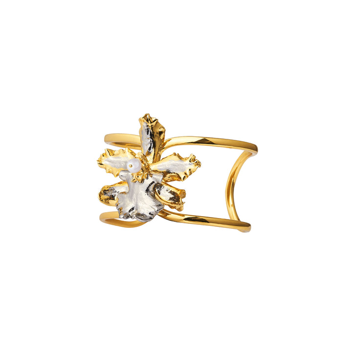 Orchid cuff bangle in gold with palladium floral center pearl, side view