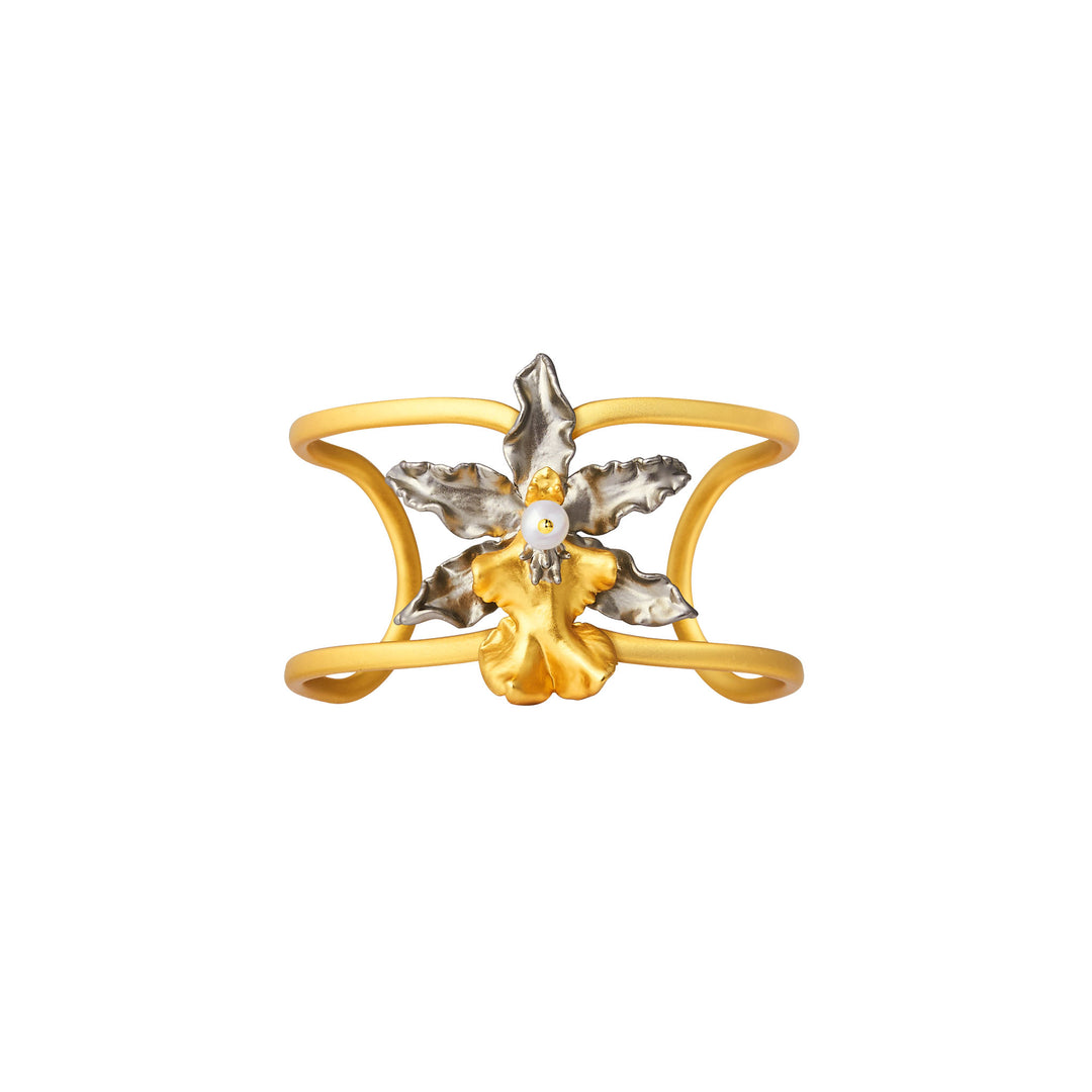 Gold cuff bangle with floral motif, palladium petals, and pearl center