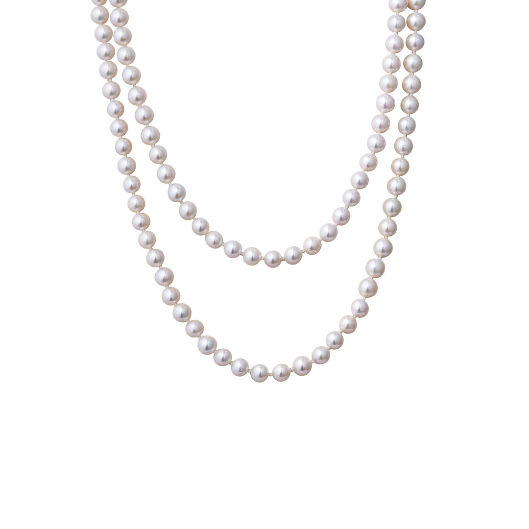 Multi-strand pearl necklace with lustrous round bead rows