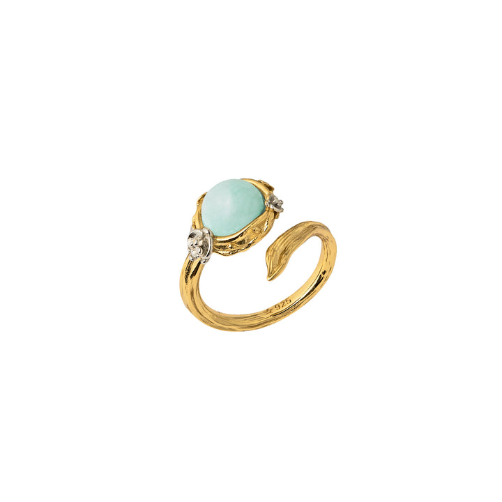 Gold halo ring with oval light-green jadeite center and small round accents