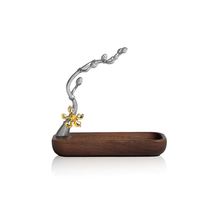 Risis Wee Kim Lian Groves Holder - A wooden base supports a silvery twisted metal stem with a gold-toned, ornate flower on top, displaying artistic craftsmanship and elegant design.