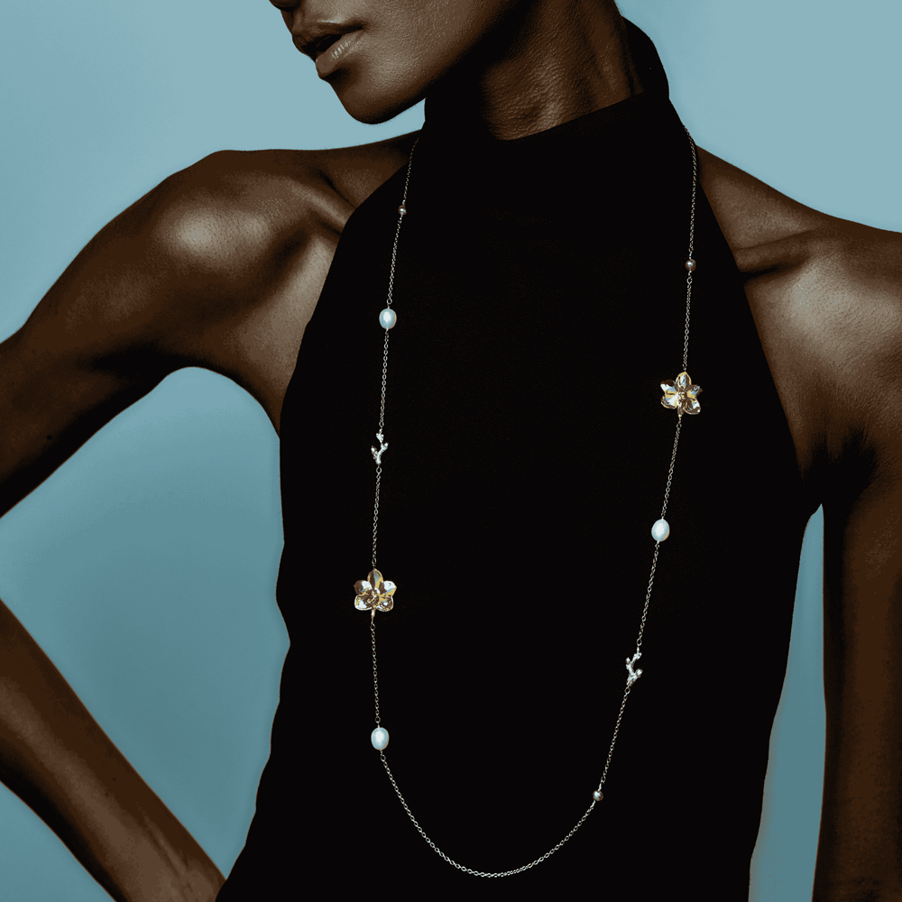 RISIS Blossom Long Necklace: Natural Ascocenda Orchids Encapsulated in 24K Swiss Gold and Palladium with Freshwater Pearls, and Encapsulated in 24K Swiss Gold with Type A Burmese Jadeite.