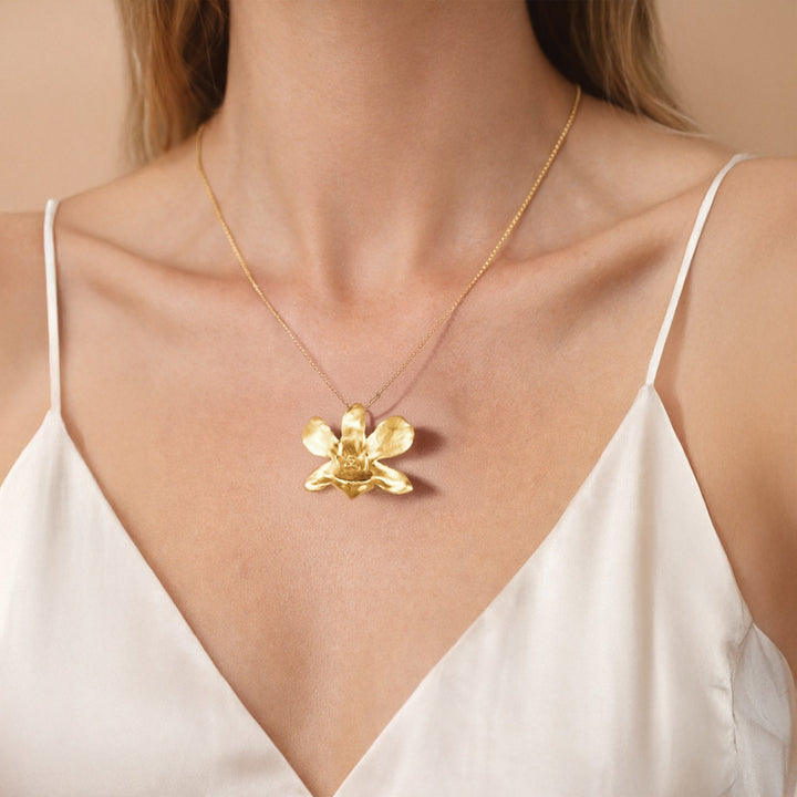 RISIS Dendrobium Thong Chai Orchid Necklace cum Brooch, Natural Orchid and brass chain encapsulated in 24K Swiss Gold