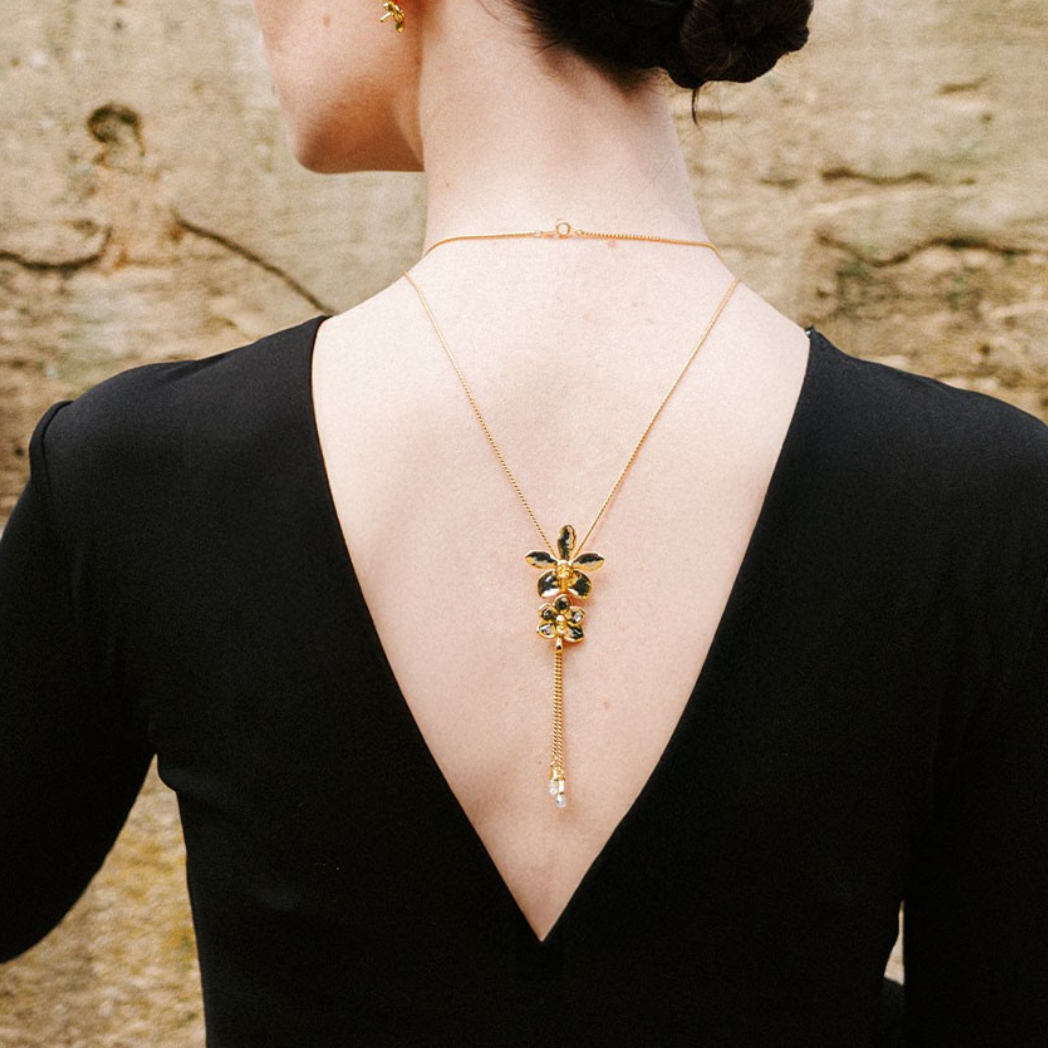 RISIS Dual Orchid Bloom Long Slider Necklace in 24K Gold & Palladium with Crystal Tailends