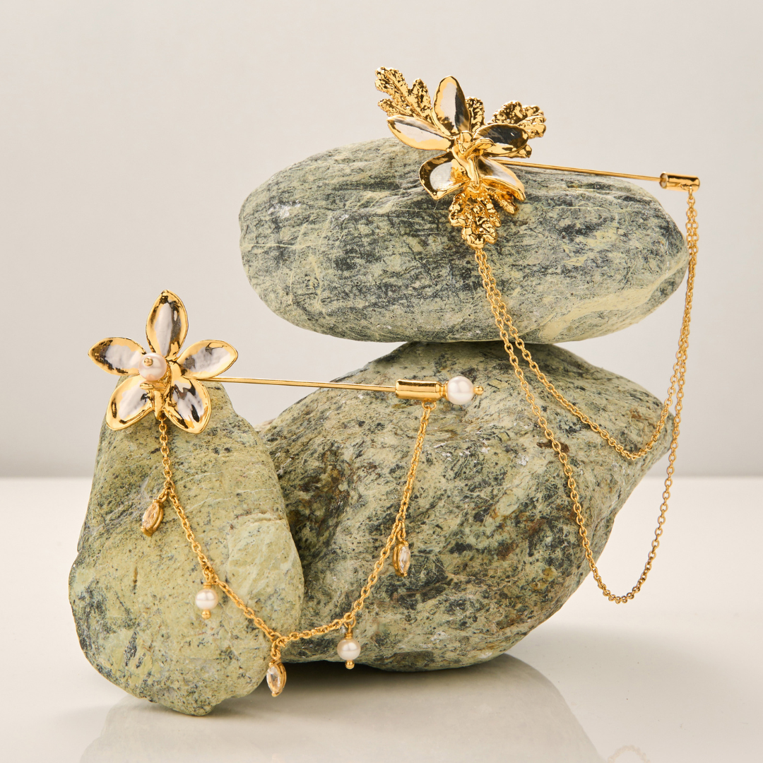 RISIS Natural Aeridovanda Orchid Brooch encapsulated in 24K Swiss Gold and Palladium Silver with Freshwater Pearls and Marquise Cut White Topaz