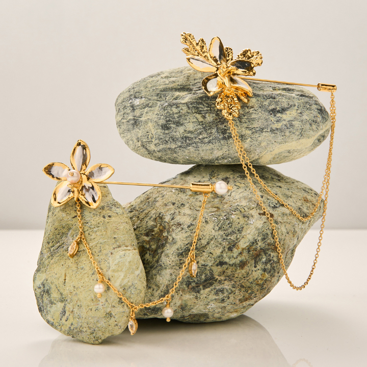 RISIS Natural Aeridovanda Orchid Brooch encapsulated in 24K Swiss Gold and Palladium Silver with Freshwater Pearls and Marquise Cut White Topaz