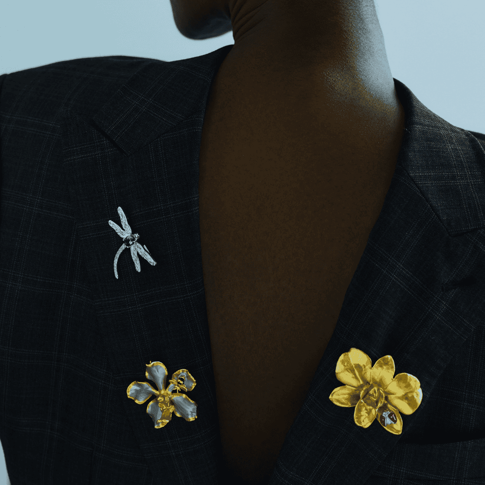RISIS Natural Vanda Orchid Brooch encapsulated in 24K Swiss Gold and Palladium; RISIS Wings of Botany Ladybird-on-Orchid Brooch - Natural Dendrobium Eleanor Chan Orchid encapsulated in 24K Swiss Gold