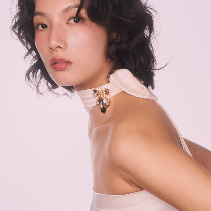 RISIS Oncidium Black Onyx Brooch, Natural Oncidium Sweet Sugar Orchid encapsulated in 24K Swiss Gold and Palladium with Black Onyx